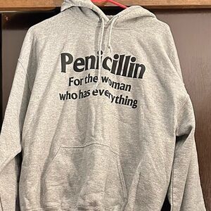 Hoodie with pocket and pull strings